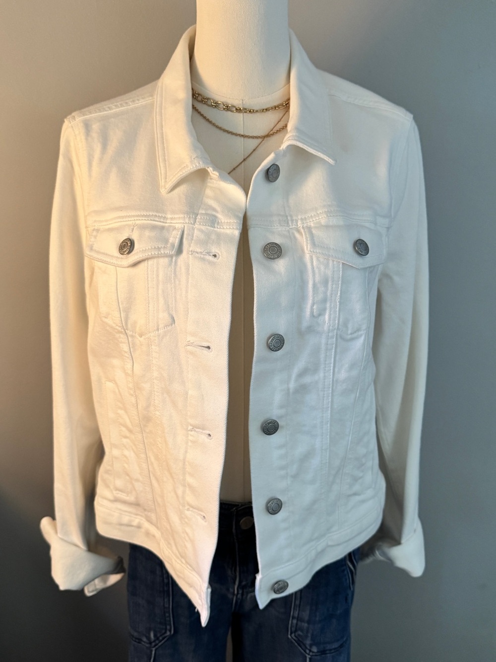 Women’s Denim Trucker Jacket in White. Classic Button-Front